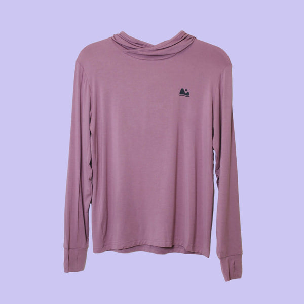 Mauve long-sleeve shirt with a small logo on a light purple background