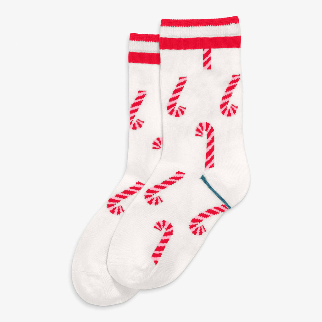 A pair of white crew socks with a red and white candy cane pattern and red ribbed cuffs, displayed against a light gray background.