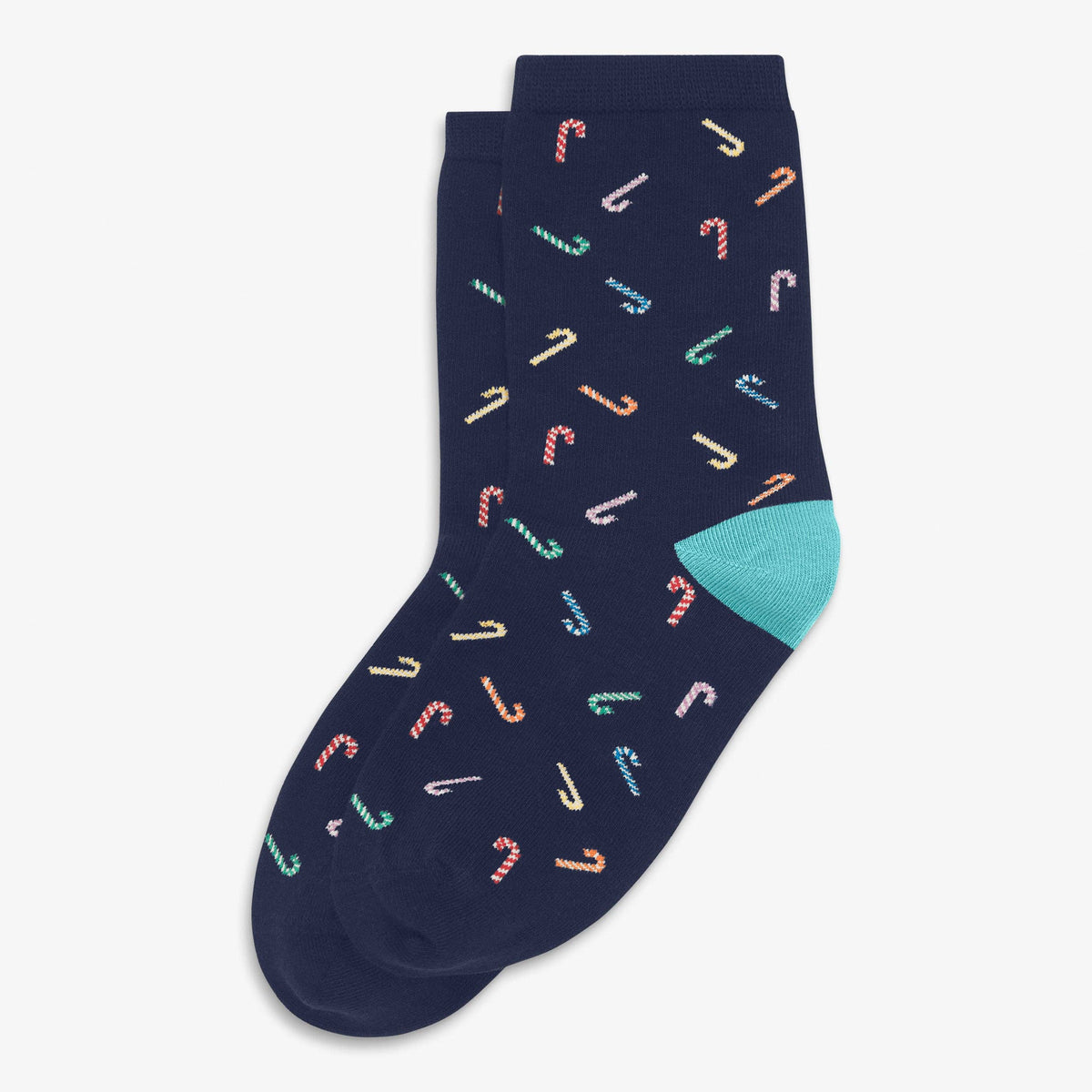 A pair of navy blue crew socks with a repeating pattern of small candy canes in pastel colors and a solid mint green heel, shown on a light gray background.
