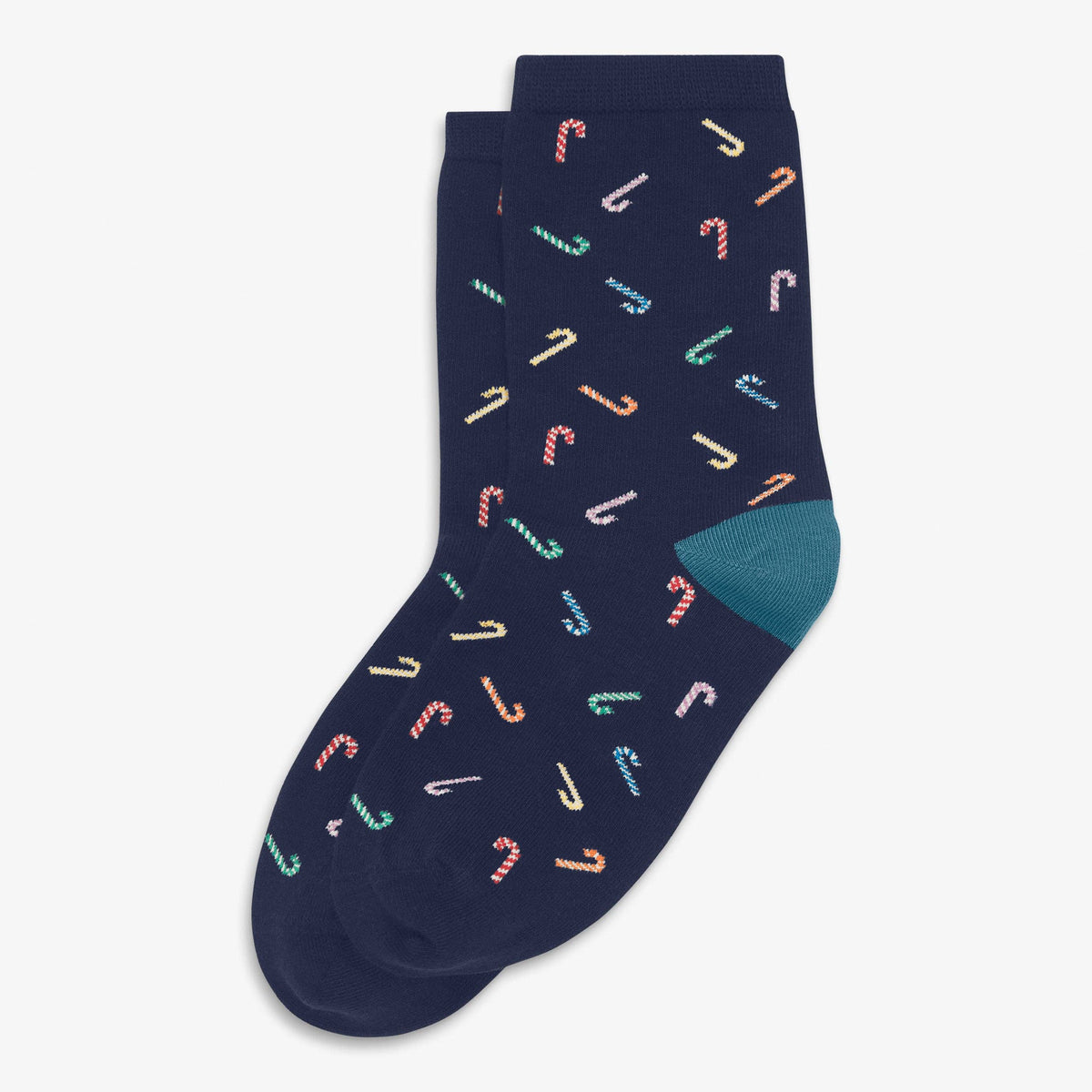 A pair of navy blue crew socks with a repeating pattern of small candy canes in pastel colors and a solid mint green heel, shown on a light gray background.