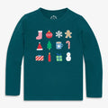 A dark teal long-sleeve crewneck shirt with a festive Christmas graphic on the chest, featuring icons of a stocking, ornament, snowflake, gingerbread man, Santa hat, Christmas tree, mug, candy cane, gifts, candle, and snowman. The brand name 'ALMADE' is visible on the inner neck label.