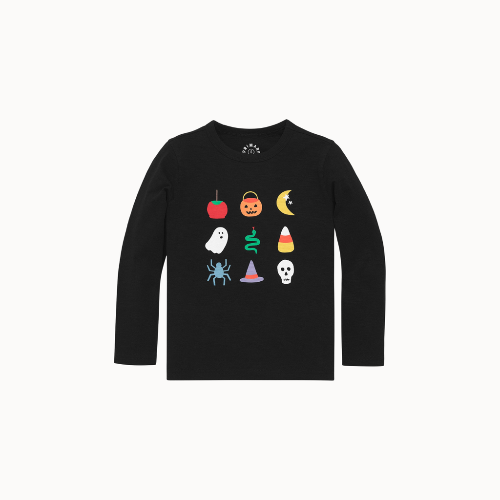 A black long-sleeve crewneck shirt for kids, featuring a graphic print of nine Halloween-themed icons (apple, pumpkin, moon, ghost, snake, candy corn, spider, hat, skull) arranged in a grid on the chest, displayed against a solid off-white background.