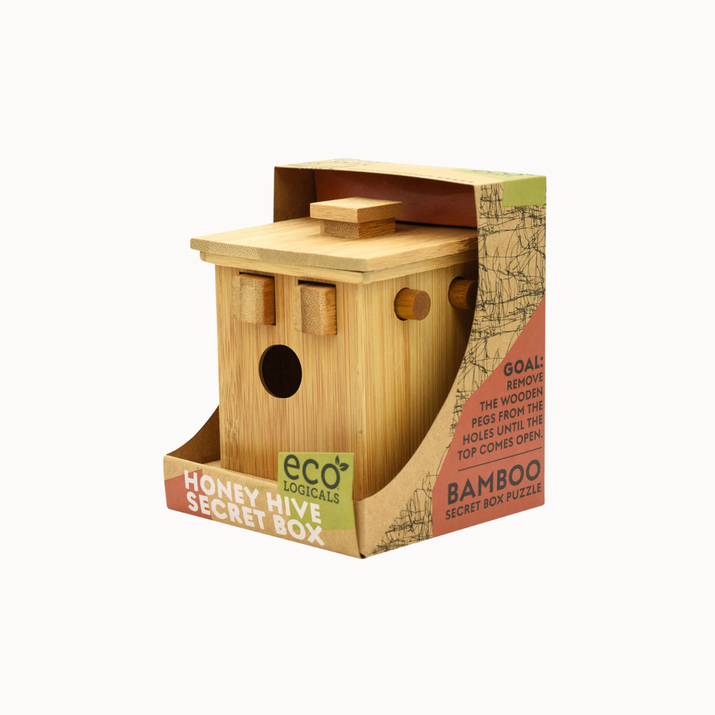 Bamboo honey bee secret box puzzle in its original cardboard packaging, featuring a light natural bamboo hive with a circular hole and a small top lid, on a white background.