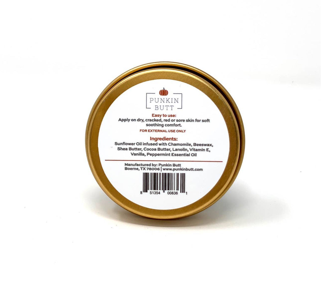 Gold tin with a white label on a white background