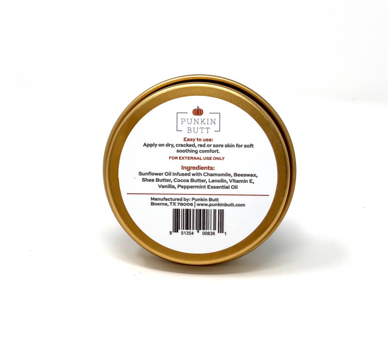 Gold tin with a white label on a white background