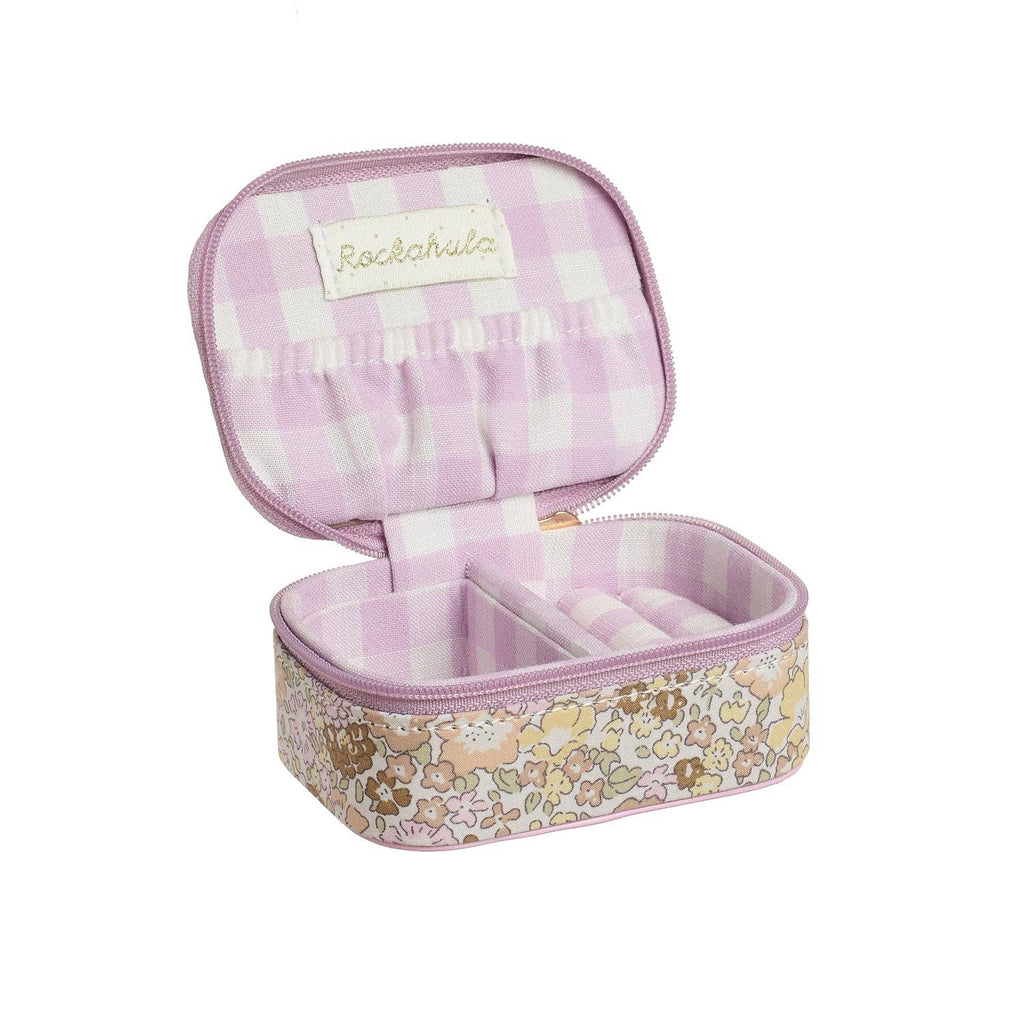 Small jewelry case with floral design on a white background
