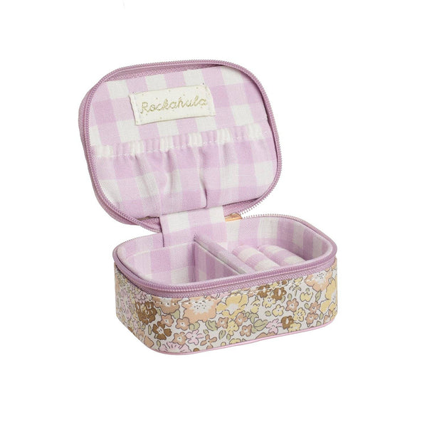 Small jewelry case with floral design on a white background