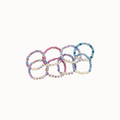 Five beaded stretch bracelets arranged in a fan shape on a plain white background. The bracelets feature pastel-colored round beads and white letter beads spelling 'DANCE'