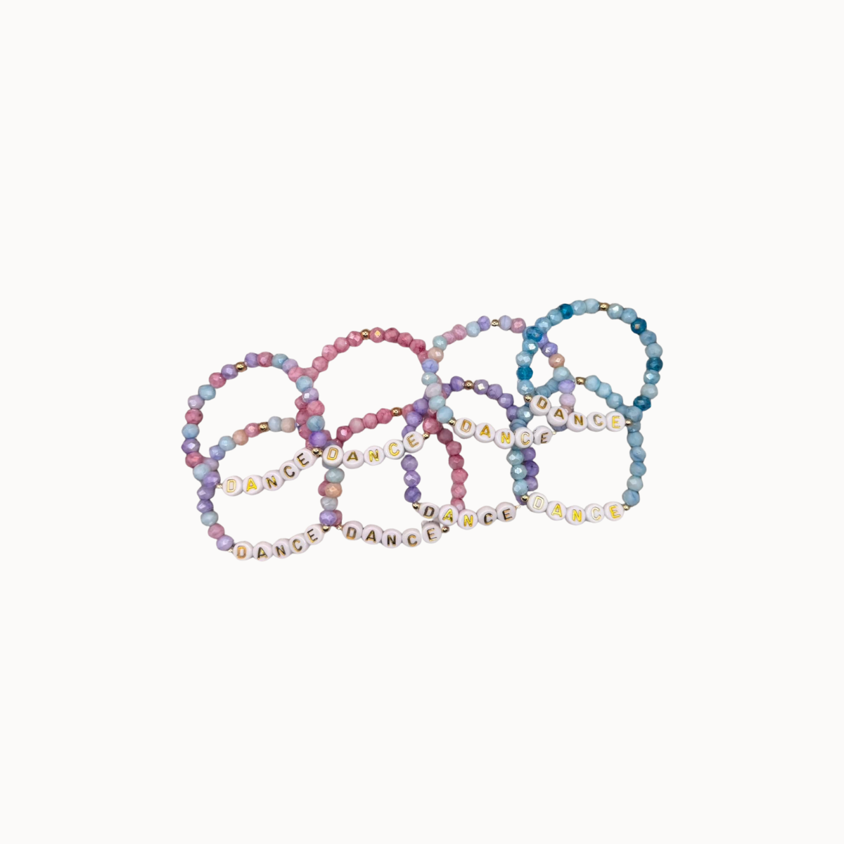 Five beaded stretch bracelets arranged in a fan shape on a plain white background. The bracelets feature pastel-colored round beads and white letter beads spelling 'DANCE'