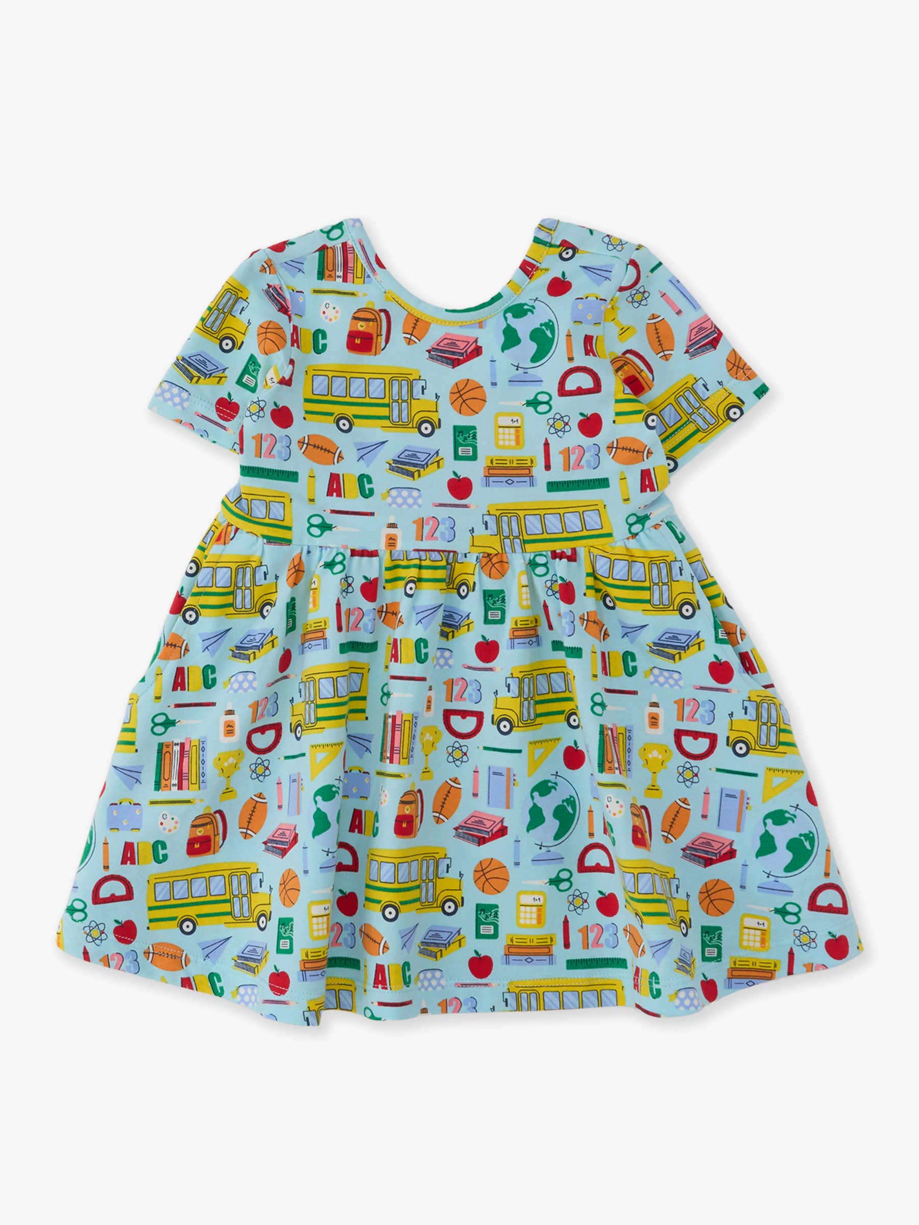 A short-sleeve baby dress with a light blue background and a colorful school-themed print featuring yellow school buses, books, apples, pencils, and numbers.