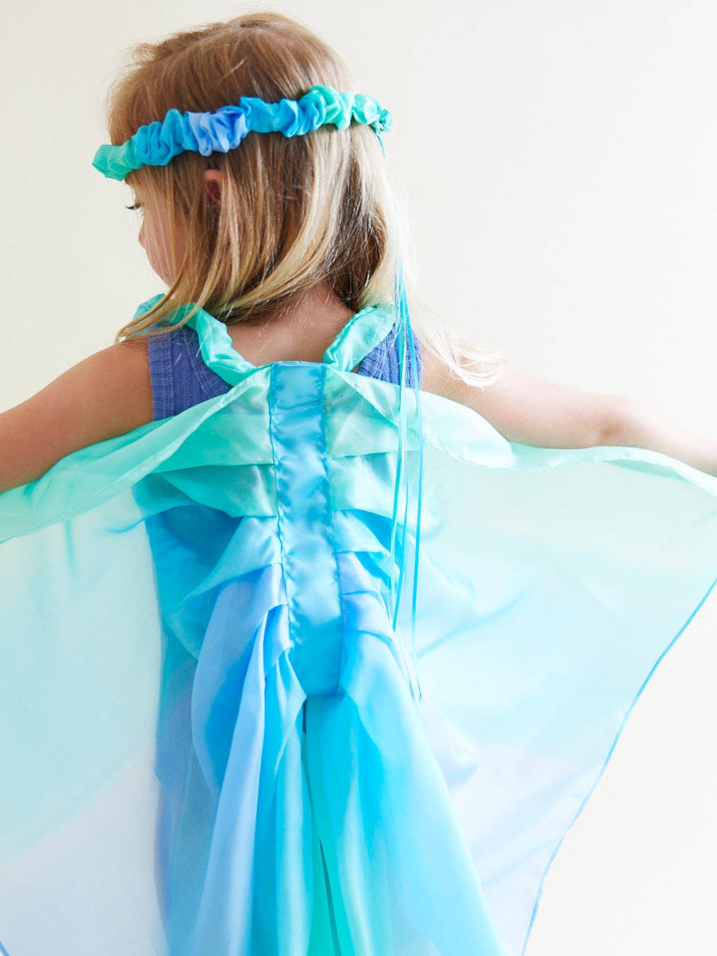 Blue silk headband on a girl
