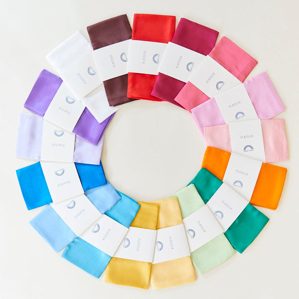 Color swatch wheel with various fabric swatches arranged in a circular pattern on a white background.
