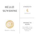 Product label for 'Hello Sunshine' with lemon icon, description, and burn information on a white background.