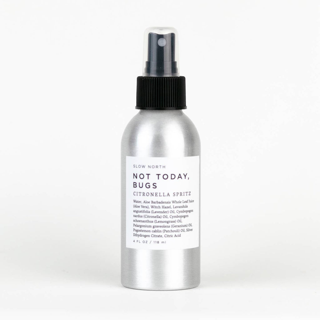Silver spray bottle labeled 'Not Today, Bugs' on a white background