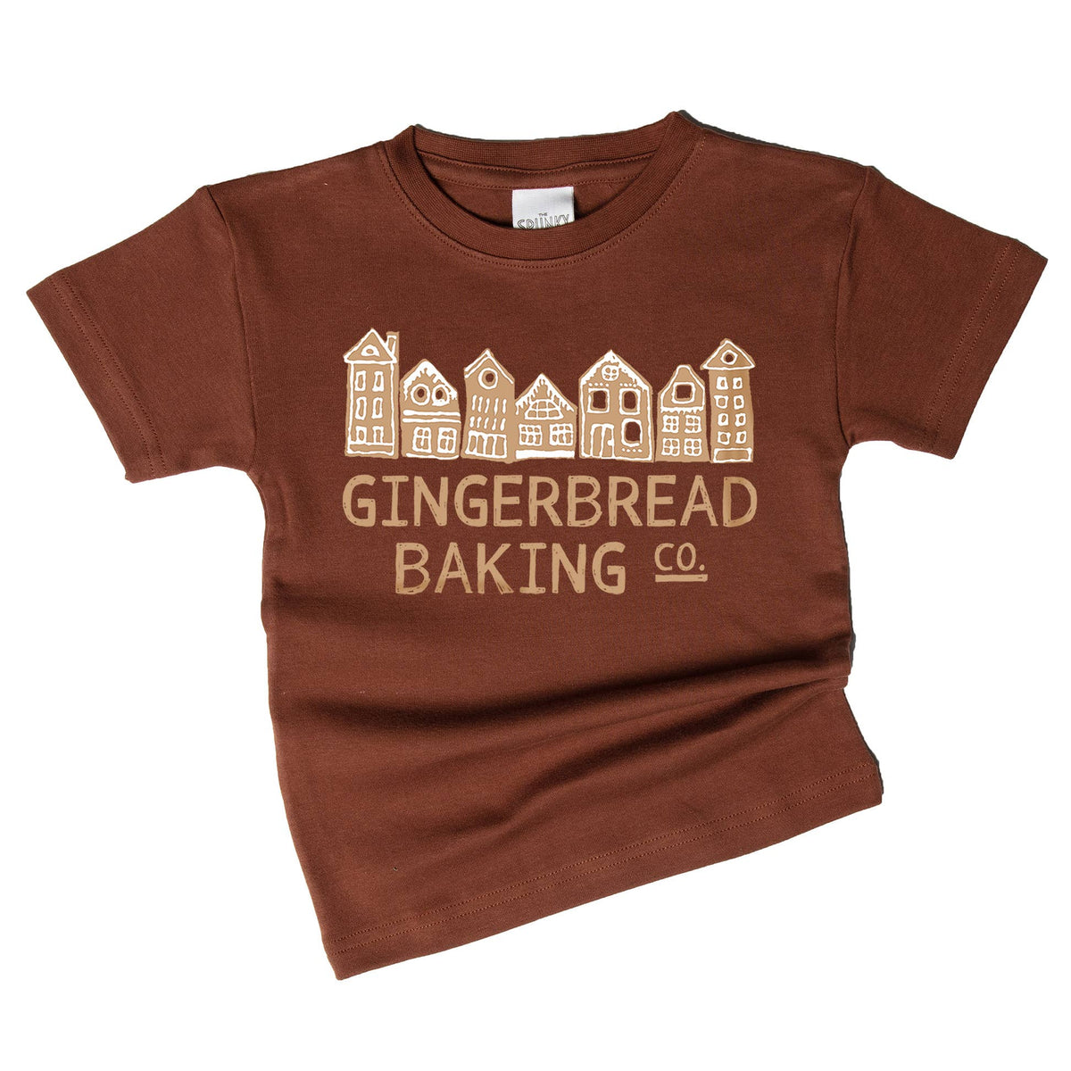 A brown short-sleeve t-shirt with a graphic of gingerbread houses and the text 'GINGERBREAD BAKING CO.' printed in a light tan color, displayed on a clean white background.