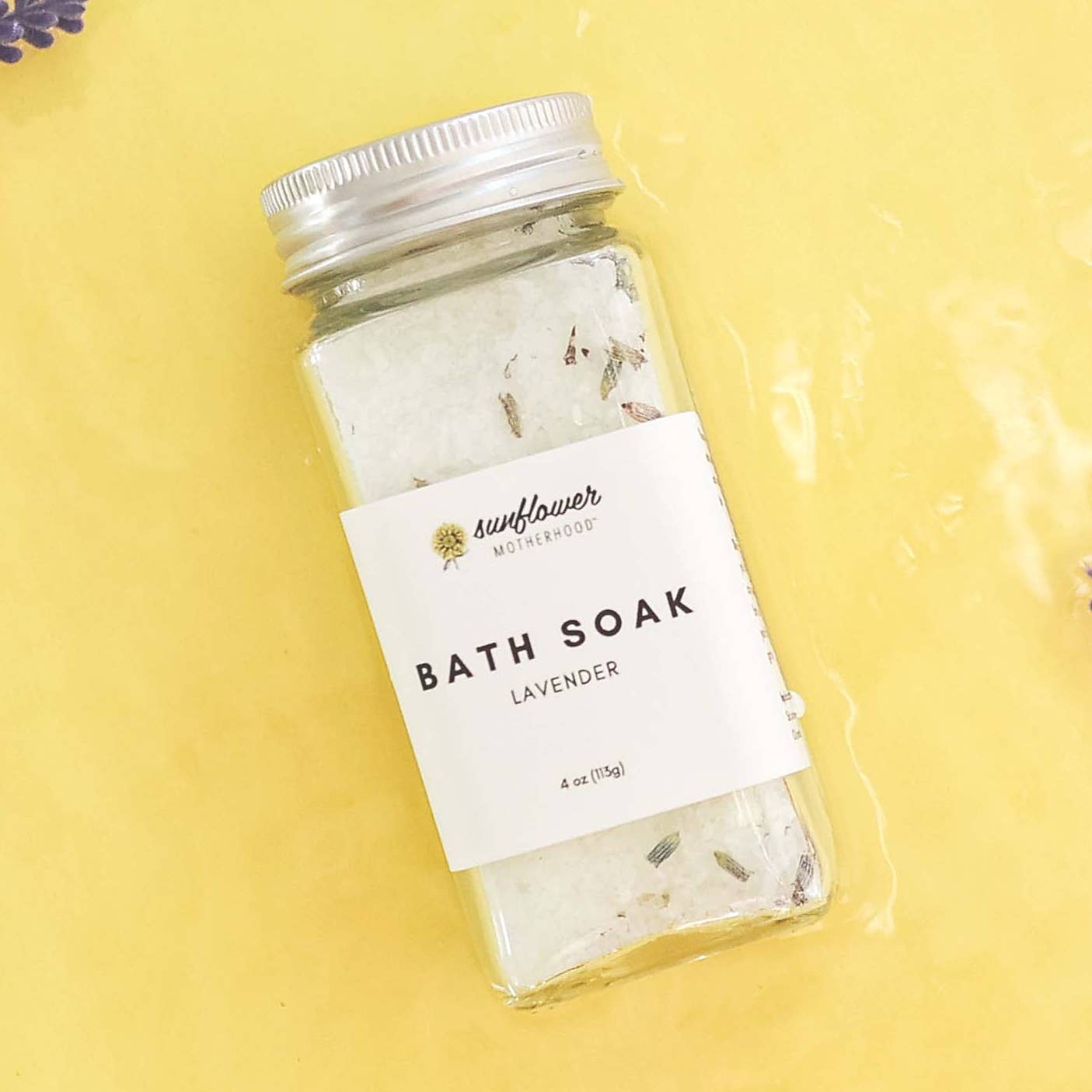Bath soak in a jar with a label on a yellow background