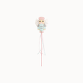 A decorative baby wand or toy featuring a cute angel character with white wings, a pink hat, and a light blue dress, holding long pink and white ribbons on a plain white background.