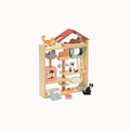 A wooden multi-level cat playhouse with painted cat figurines, perched cats, bowls, and toys, shown on a plain light background.