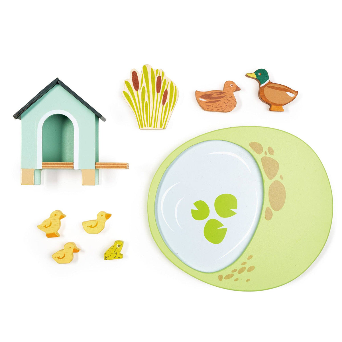 Set of children's play items including a duck, duck house, grass, and pond on a white background
