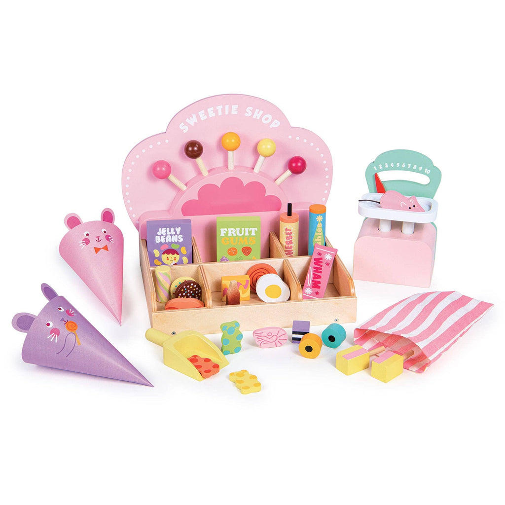 Toy set with a sweetie shop display, ice cream cones, and other accessories on a white background