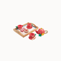 A small wooden tea party set on a white background, including a tray with two red cups, a teapot, cookies, and a small plate.
