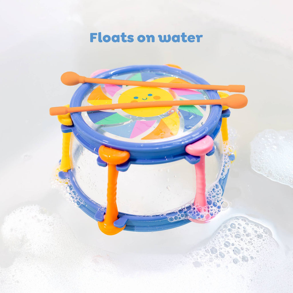 Colorful children's drum with drumsticks on a white background