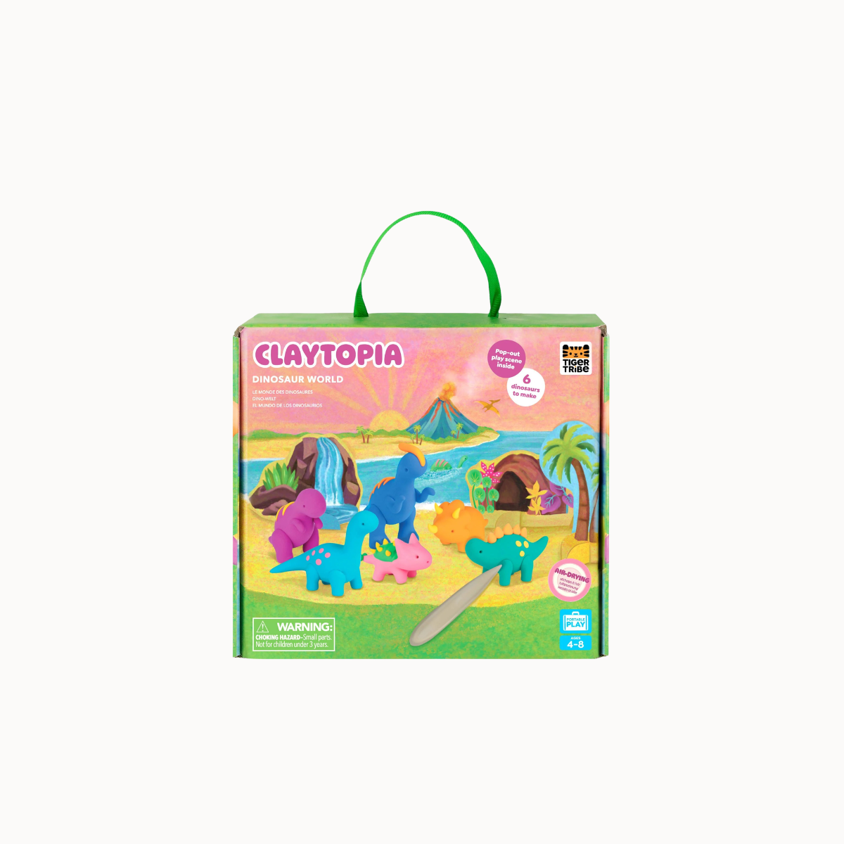 Claytopia Clay Studio Kit in its original packaging, featuring a colorful box with dinosaur illustrations and a green carrying handle, set against a plain white background.