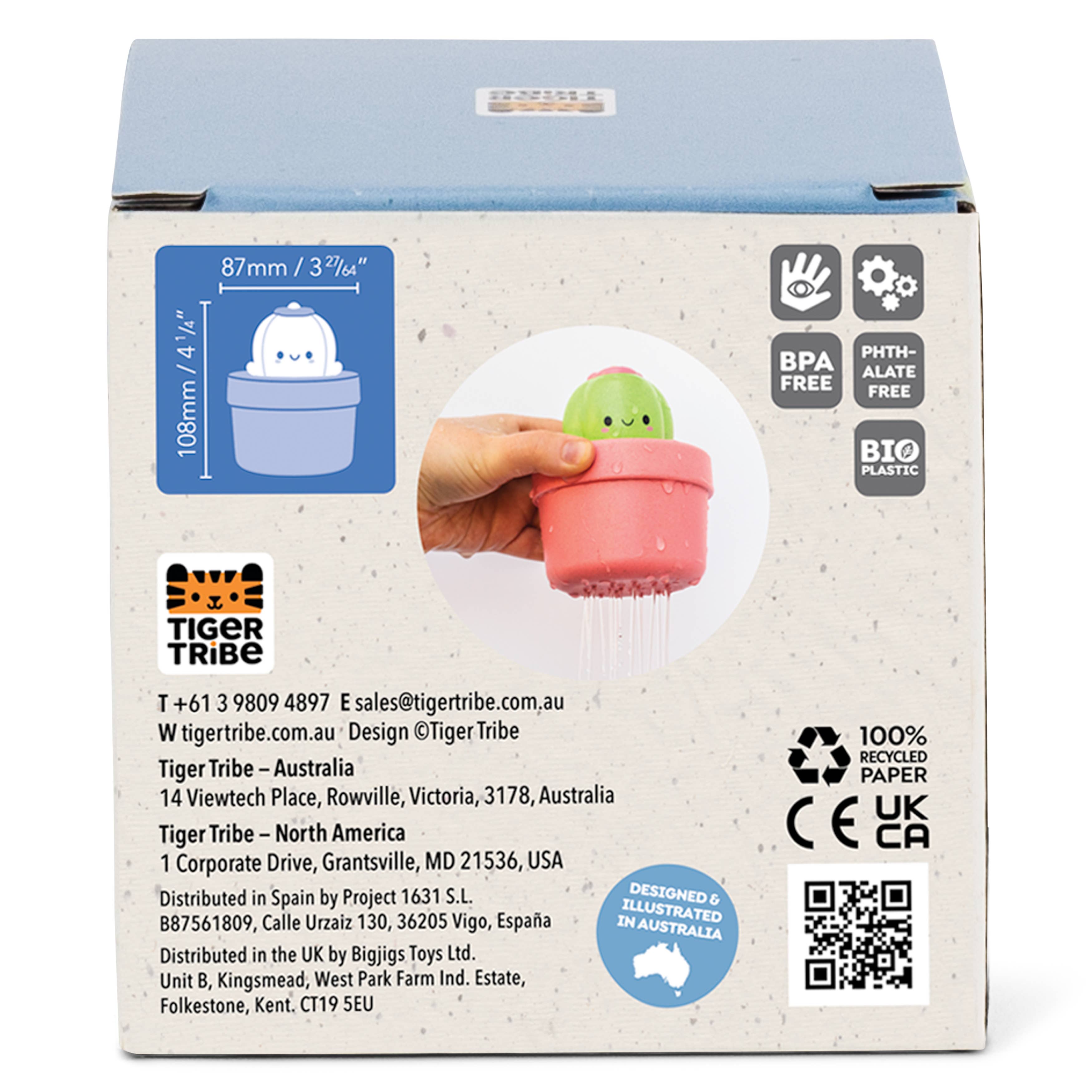 Product packaging with a small green creature in a pink pot, Tiger Tribe branding, and various certification logos.
