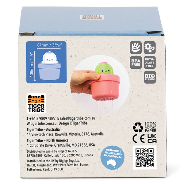 Product packaging with a small green creature in a pink pot, Tiger Tribe branding, and various certification logos.
