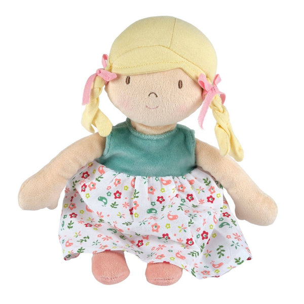 Plush doll with blonde hair, green top, and floral dress on a white background