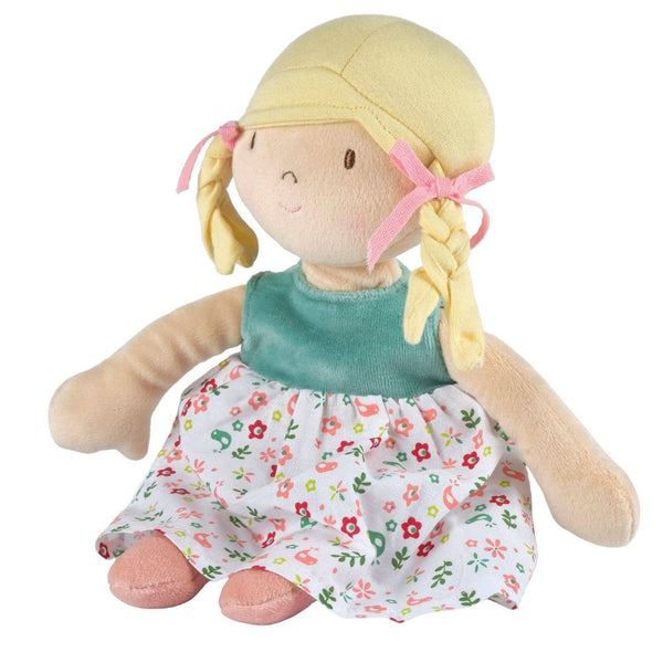 Plush doll with blonde hair, green top, and floral dress on a white background