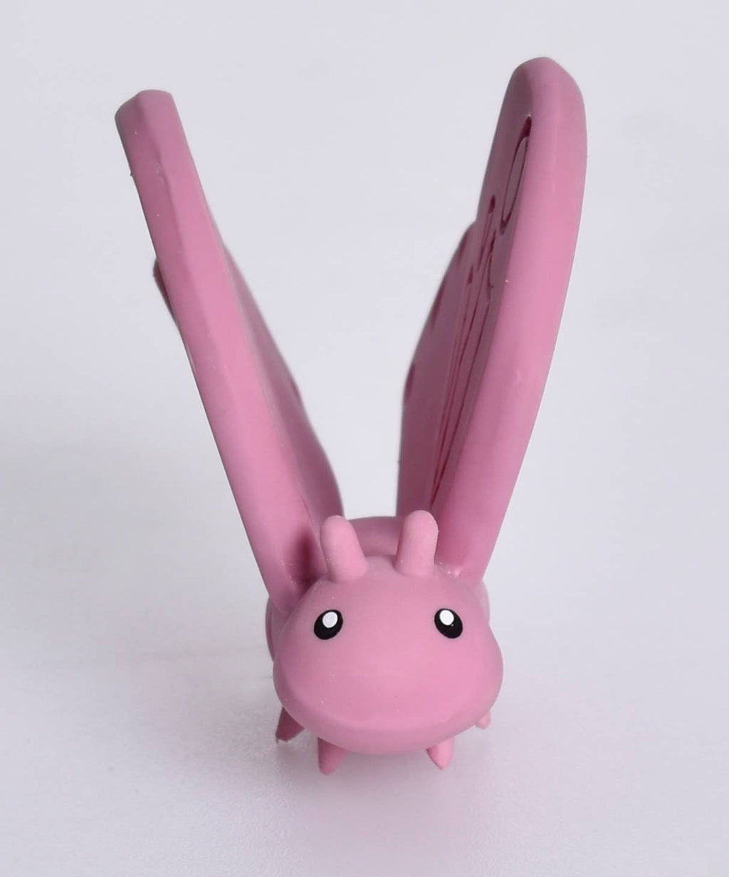 Pink hair straightener with cartoon face on a white background