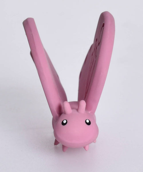 Pink hair straightener with cartoon face on a white background