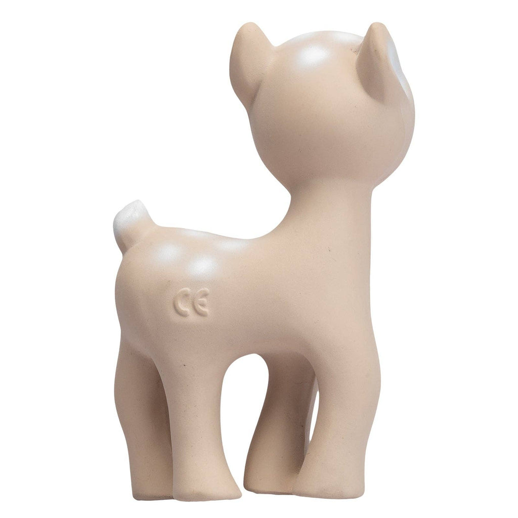 Beige toy deer figurine on a white background