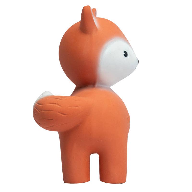 Orange and white fox figurine on a white background