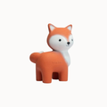 An orange and white rubber fox toy with a small embossed 'TIGER' logo on its side, shown against a plain off-white background.