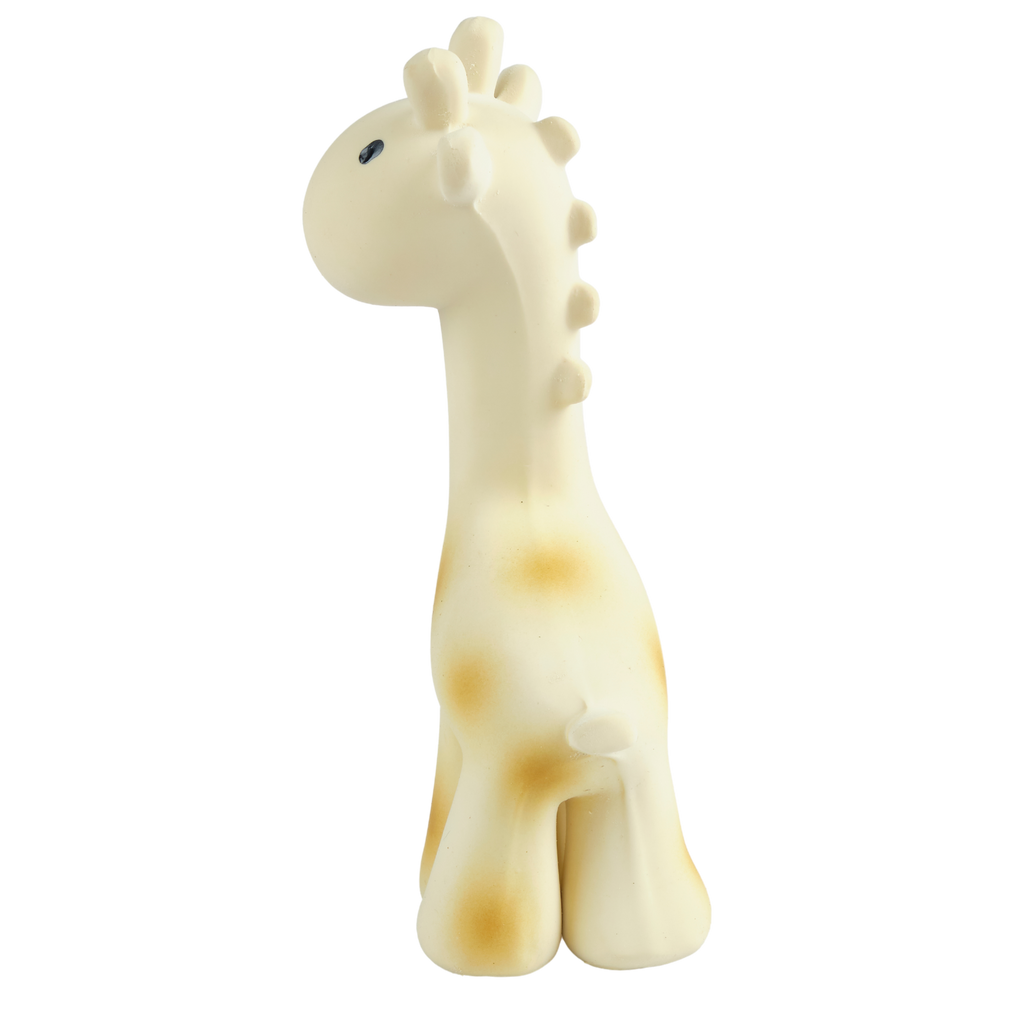 A cute silicone giraffe toy or chew in a cream color with light brown spots, shown against a plain white background.