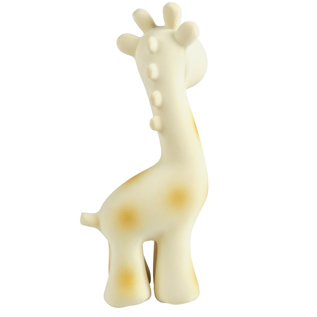 A giraffe-shaped baby teether or toy in a warm cream color with soft tan spots, shown against a plain white background.