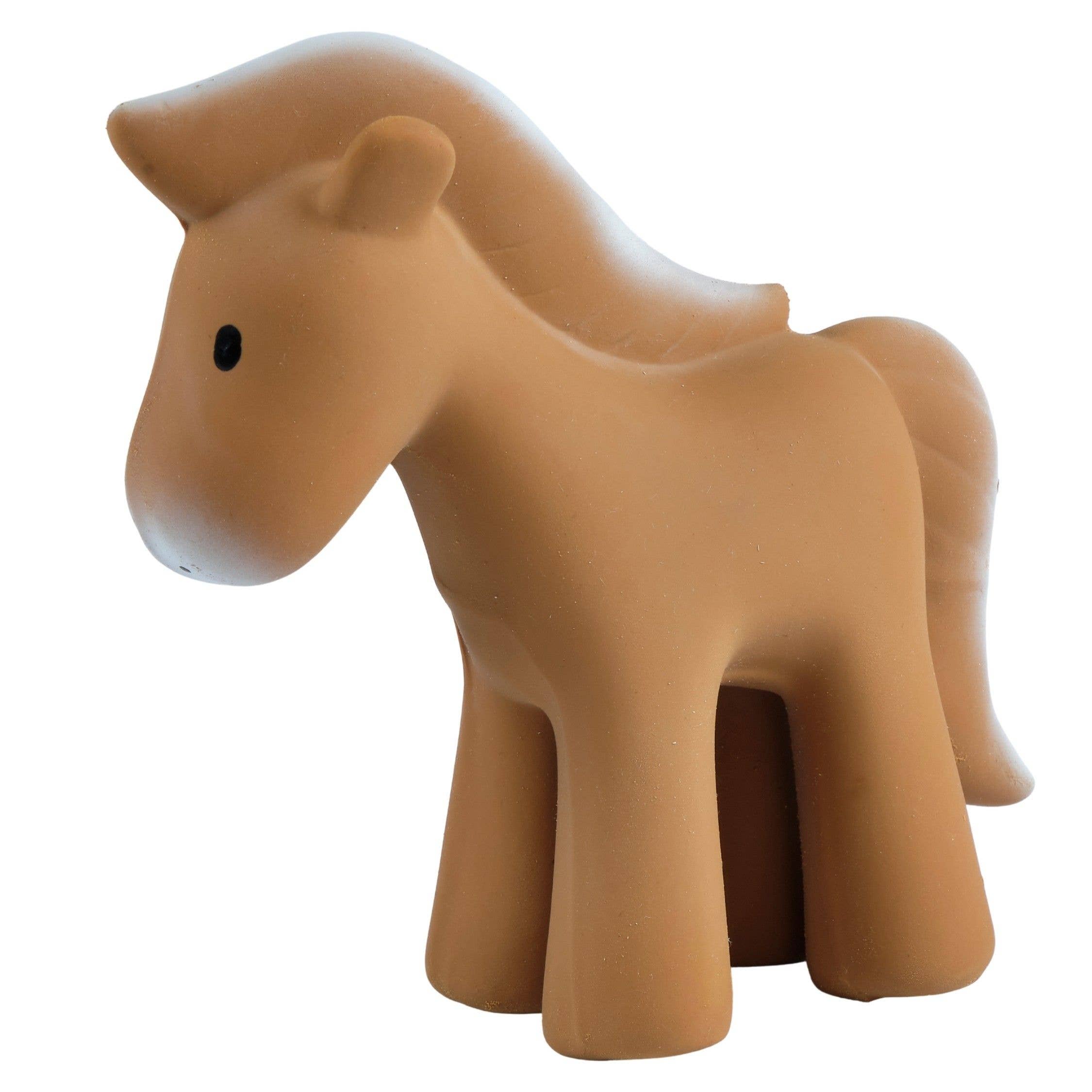 A small, stylized horse-shaped object in a matte tan-brown color, photographed against a plain white background.