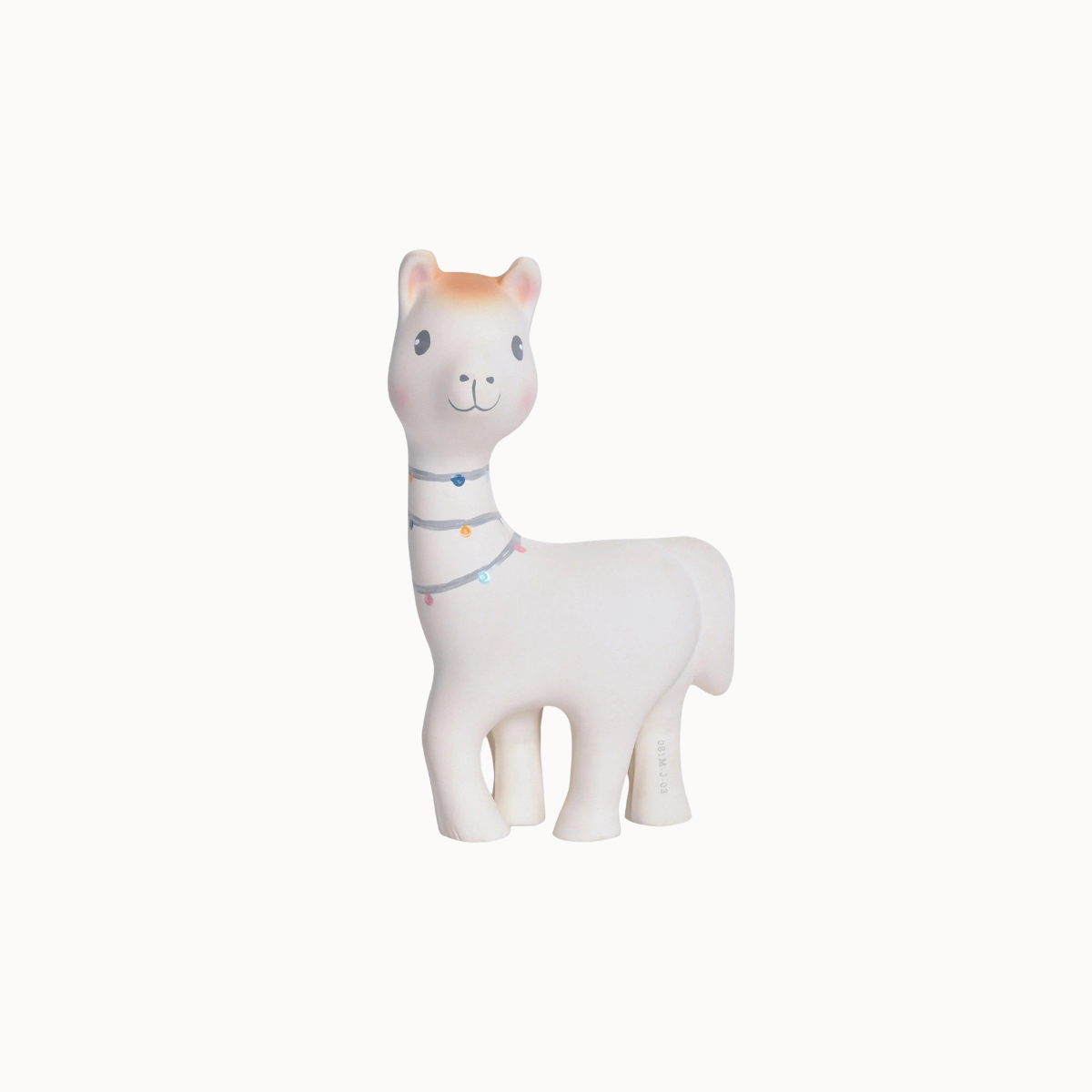 A white llama toy figurine with a small orange patch on its forehead, blue eyes, and a colorful string-light style collar, shown against a plain off-white background.