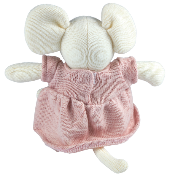 Knitted toy with a pink dress on a white background
