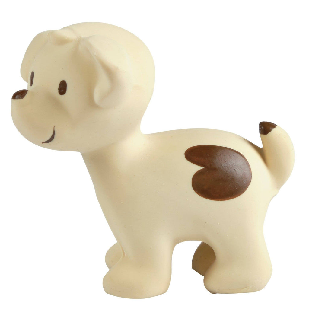 Toy dog figure with a brown spot on a white background