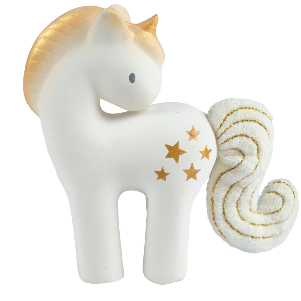 White unicorn figurine with gold stars and accents on a white background