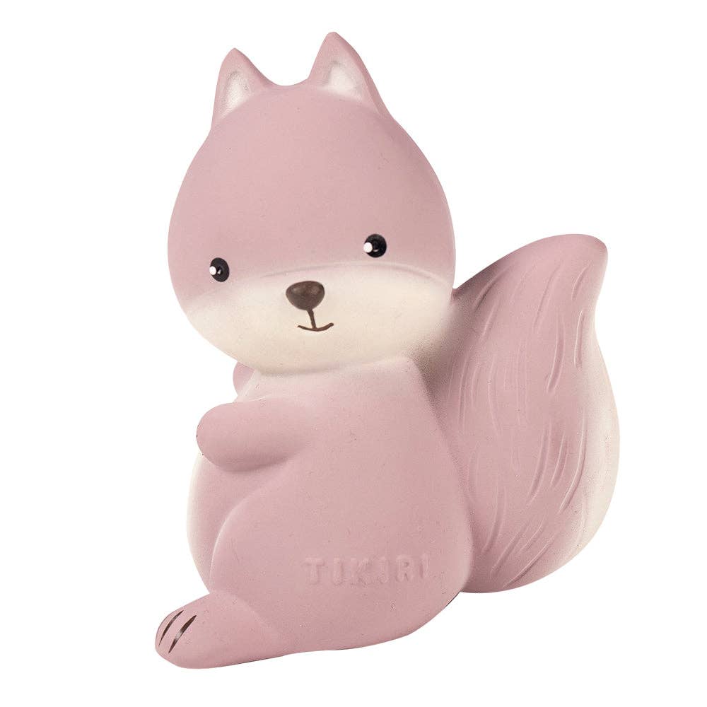 Pink squirrel-shaped night light with 'Tikiri' branding on a white background