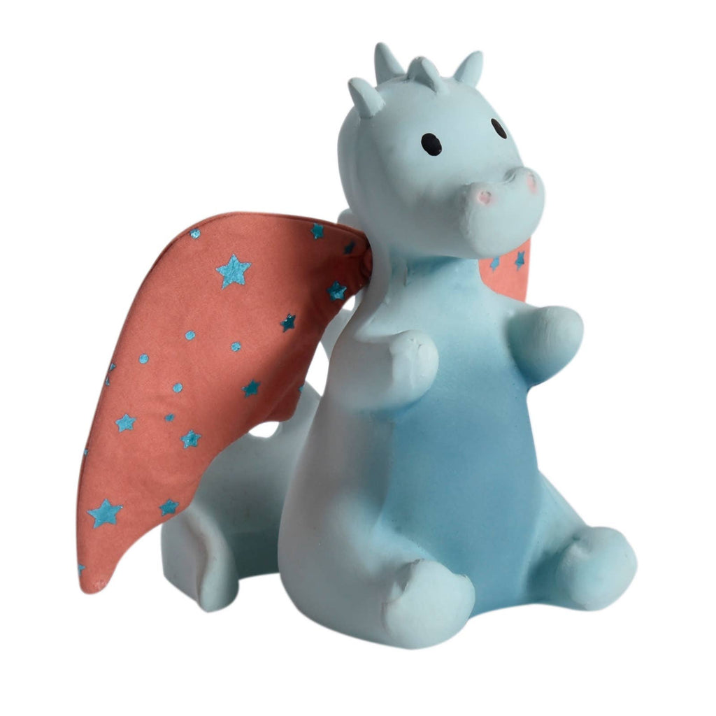 A light blue dragon figurine with soft pink wings decorated with small blue stars, set against a plain white background.