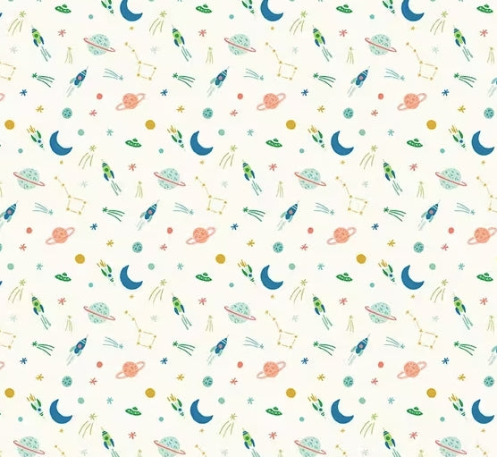A repeating celestial pattern on a warm off-white background, featuring blue crescent moons, green rockets and planets, orange Saturn-like rings, yellow stars, and small multicolored space motifs.
