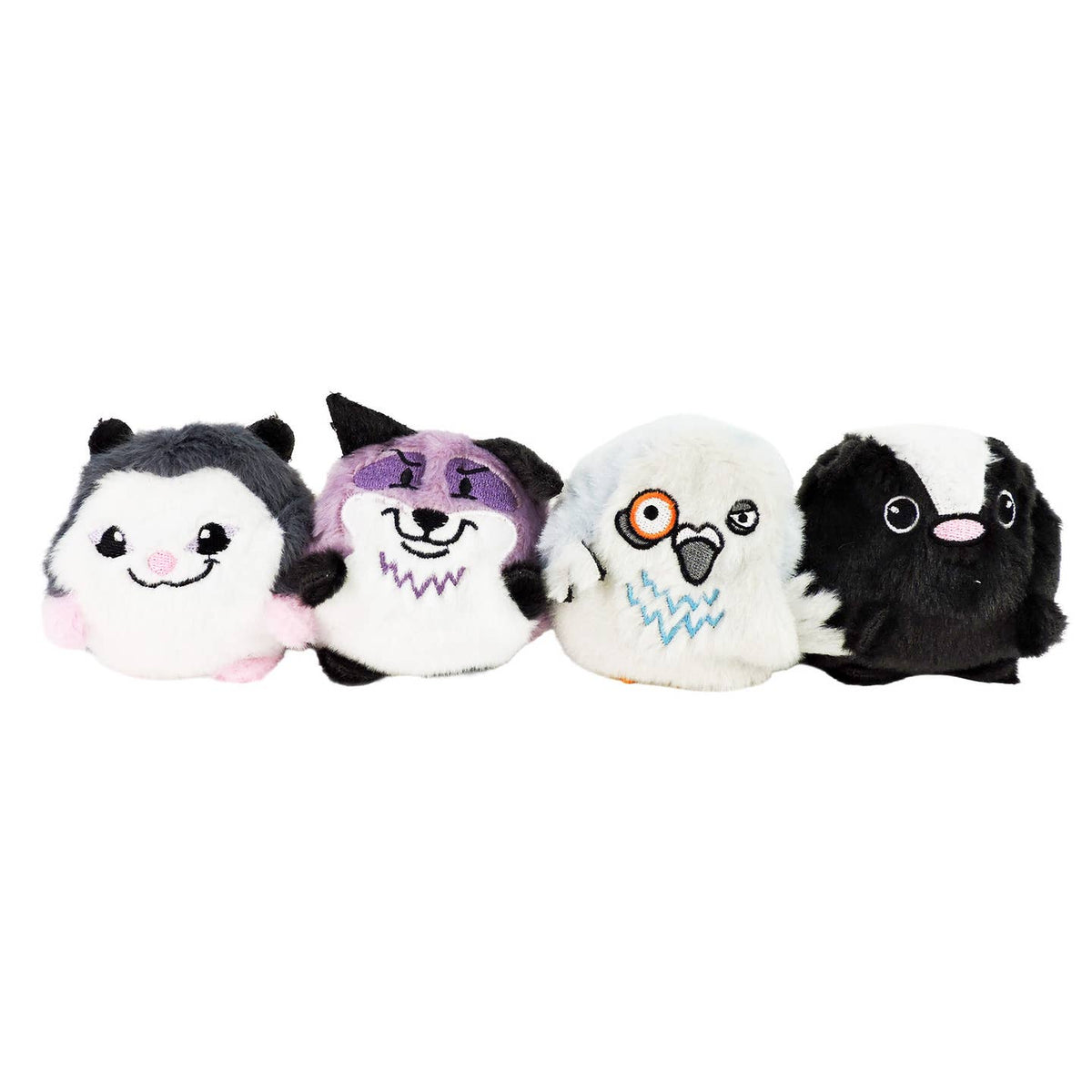 Four plush toys with different designs on a white background