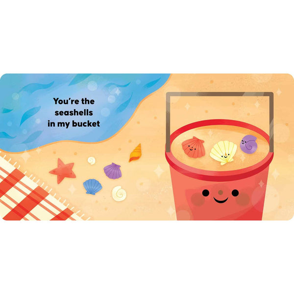 Illustration of a red bucket with seashells on a beach scene, featuring text 'You're the seashells in my bucket'.