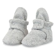 Pair of gray baby booties on a white background