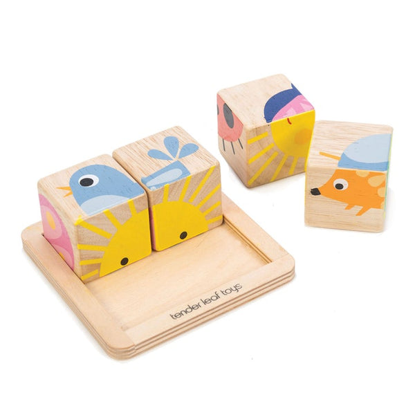 Wooden blocks on a tray on a white background